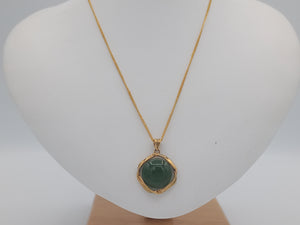Eye shaped jade in gold plated pendant